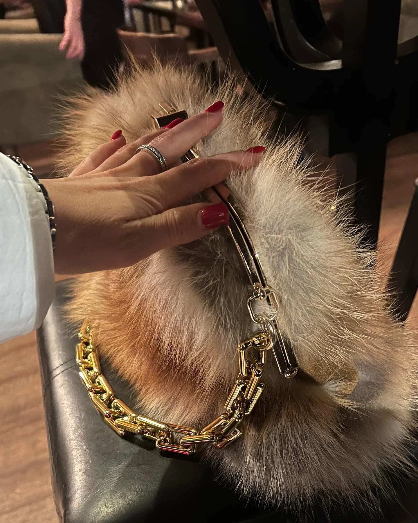Fox fur bag with a gold-tone chain